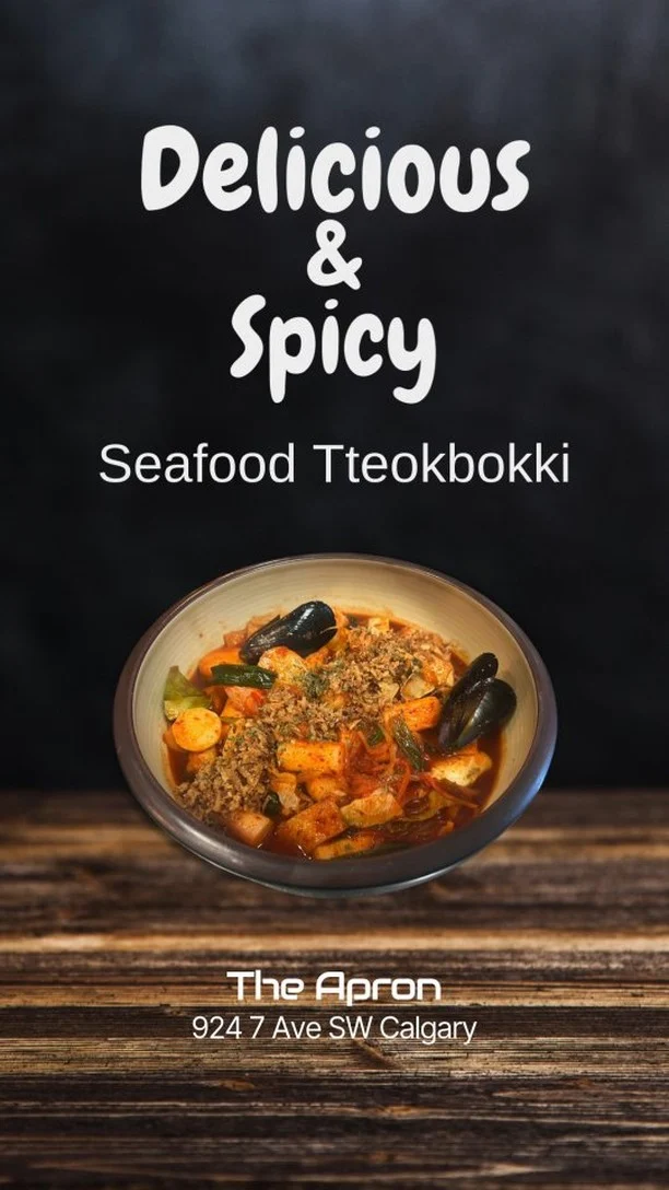 🔥 Craving something bold and satisfying? Try our Spicy Seafood Tteokbokki at The Apron Korean Kitchen! 🍜✨

A perfect fusion of chewy rice cakes, fresh seafood, and spicy-sweet sauce—this dish will warm your heart and excite your taste buds! ❤️🔥

Don’t miss out—come enjoy it today! 🦑🍤🌶️

Also, join us on xiaohongshu RedNote @ theapronyyc! 📕
--
#TheApron #WinterComfortFood #SeafoodTteokbokki #KoreanCuisine #KoreanKitchen #FoodieHeaven #gastronovation #yyc #foodie
#에이프런 #겨울별미 #해물떡볶이 #매콤한맛 #한식맛집 #맛집추천 #가스트로노베이션 #캘거리 #맛집
#冬日美食 #海鲜炒年糕 #韩国料理 #韩国厨房 #吃货天堂 #美食创新 #卡尔加里 #吃货
